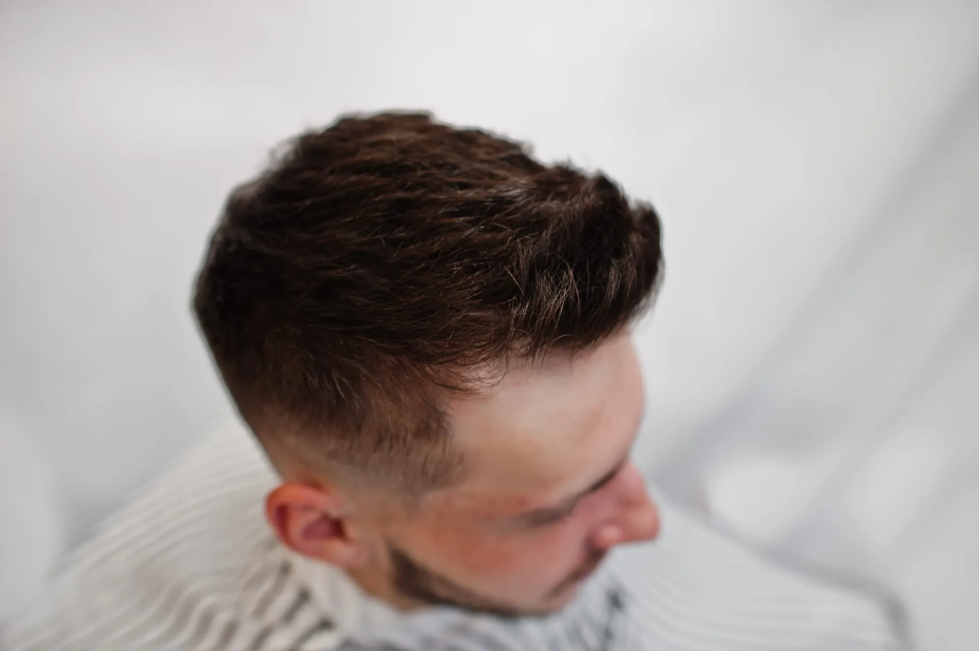 Short-cut hair at the back and sides of the head